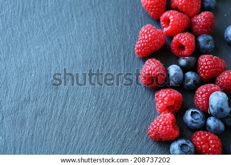 berry mix on the slate background, fresh food