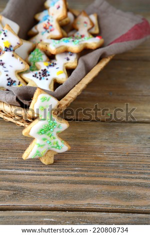 Christmas cookies with colored glaze in a basket, sweet food