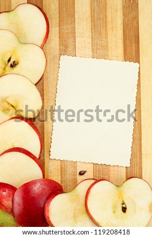 The page of the culinary book decorated with apples with a place of a copy for your record or page of a photograph album