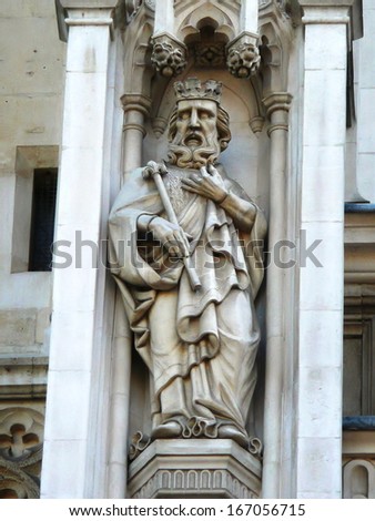 LONDON, UK - JULY 6: Statue of king from Westminster Abbey on July 6, 2013 in London. Westminster Abbey is UNESCO World Heritage Site.