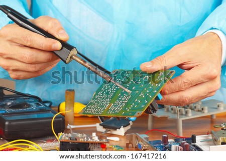 Soldering electronic board of device in the service workshop
