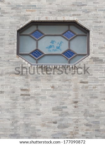 traditional Chinese window and brick wall