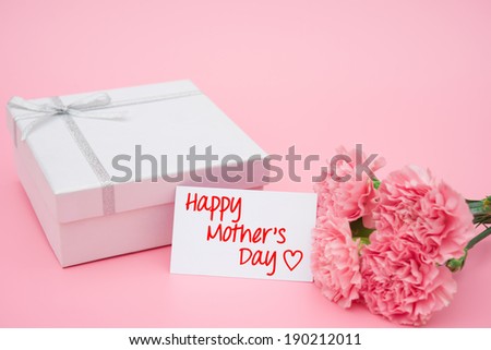 Card of Happy Mother\'s day and gift box and pink carnations