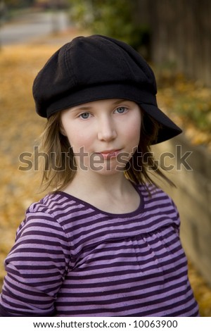 Image of a preteen with a sad smile