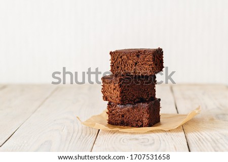 Similar – Image, Stock Photo Brownies cake squares on cooling rack. Chocolate fudge brownies