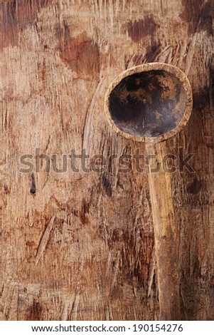 antique wooden spoon on old wooden table in rustic style