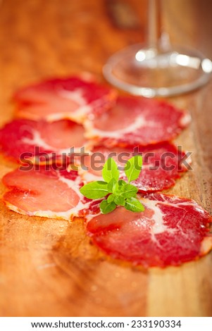antipasti Platter of Cured Meat  jamon and wine, closeup