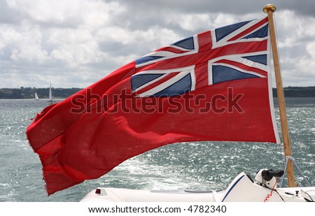 uk flag on the ship against see background