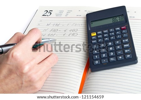 man hand with pen, notebook and Calculator isolated on white