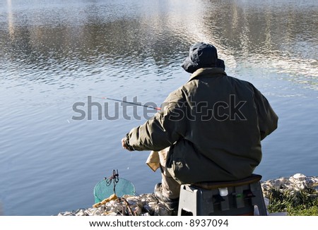 Fisherman into the lake
