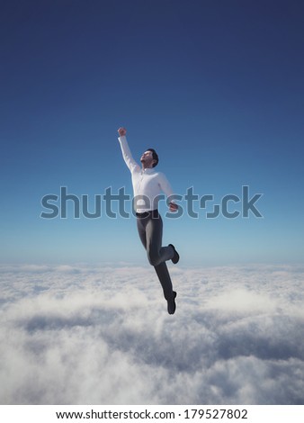 Businessman hero flying over clouds