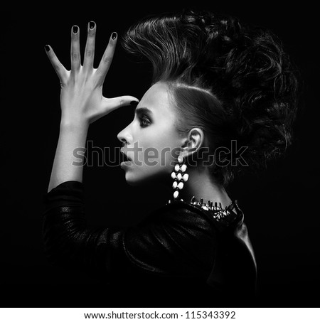 Strange stylish punk female saluting and gesturing, creative fantastic hairstyle - Iroquois