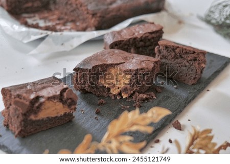 Similar – Foto Bild Eckig geschnittene Browniestücke