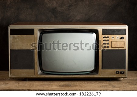 old television on old wood table