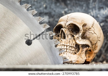skull with cutting blade, focused at skull