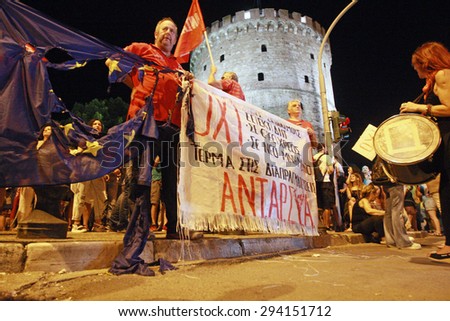 GREECE, Thessaloniki JULY 5, 2015: Supporters of the NO vote celebrate for the final NO result in the crucial greek referendum around the White Tower in Thessaloniki