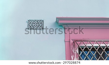 pink door and azure grill in Florence, Italy