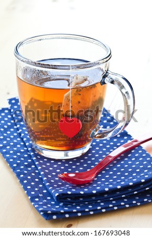 Hot tea in a mug made of glass