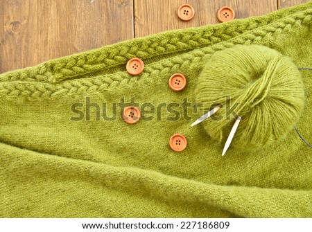 Handmade knitted scarf made from green angora wool