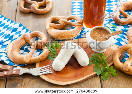 Bavarian white sausages with sweet mustard and pretzels