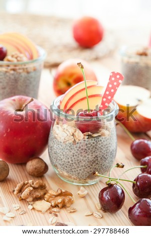 Chia Pudding with fresh fruits in vintage jars