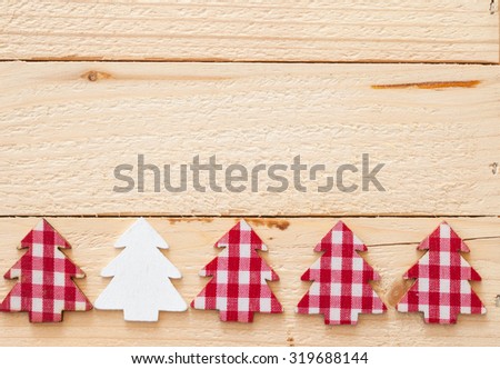 Rustic christmas background with red plaid christmas tree