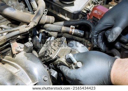 Mechanic replacement throttle body with car garage service ストックフォト © 