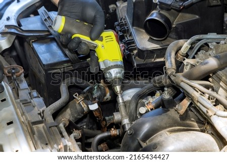 Auto mechanic replacement fuel supply with engine throttle in car part ストックフォト © 
