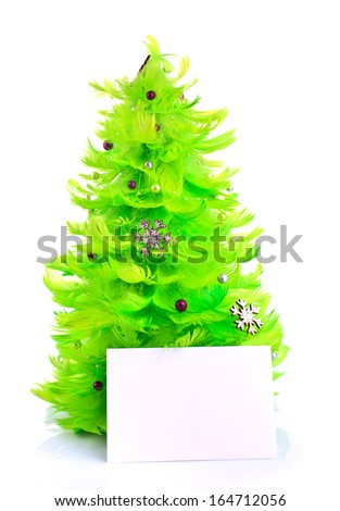green christmas tree made of feathers with greeting cards