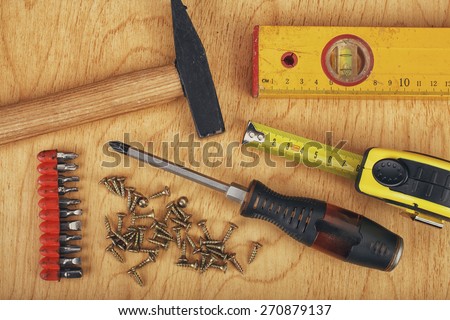 construction concept  Set of manual tools on a wooden boards background