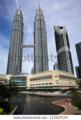 KUALA LUMPUR - DECEMBER 15: The Petronas Twin Towers are the world's tallest twin towers. The skyscraper height is 451.9m. December 15, 2010, in Kuala Lumpur, Malaysia