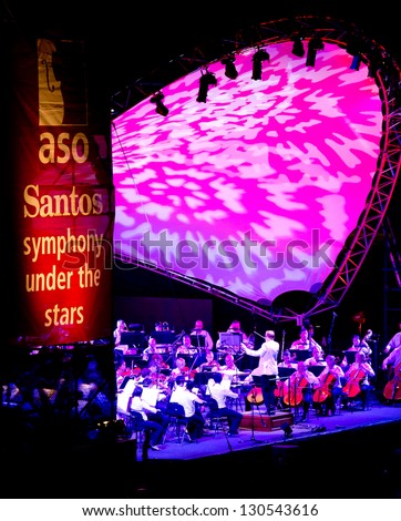ADELAIDE - FEBRUARY 28: Adelaide Symphony Orchestra plays that the free Symphony Under the Stars free  event at the Adelaide Festival Cetre on February 28, 2013 in Adelaide, Australia.