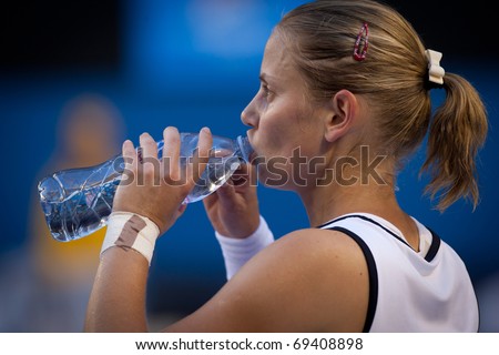 MELBOURNE - JANUARY 19: Jelena Dokic of Australia in her second round loss to Barbora Zahlavova Strycovaof the Czech Republic in the 2011 Australian Open on January 19, 2011 in Melbourne, Australia