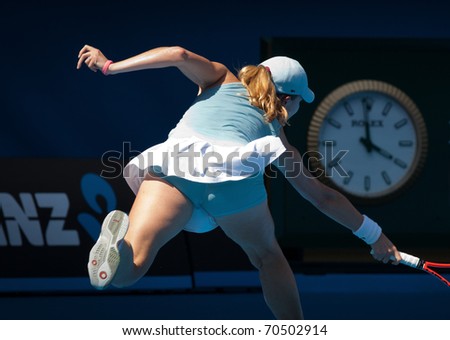 MELBOURNE - JANUARY 22: Alize Cornet of France in her third round loss to Kim Clijsters of Belgium in the 2011 Australian Open - January 22, 2011 in Melbourne