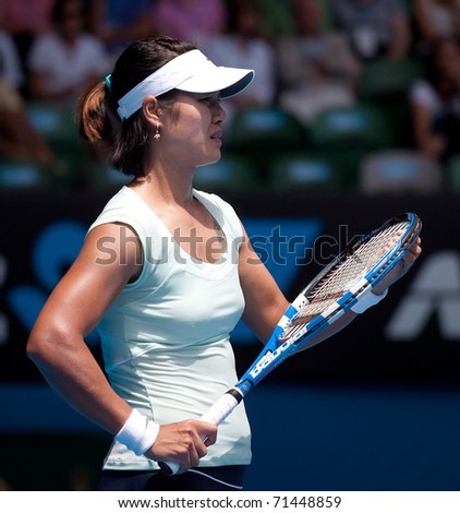 MELBOURNE - JANUARY 25: Li Na of China in her quarter final win over  third round win over Andrea Petkovik of Germany in the 2011 Australian Open on January 25, 2011 in Melbourne, Australia.