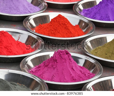 Coloured powders at market in Orchha, India