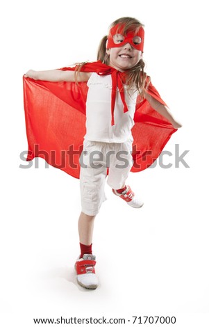 Superhero little girl in a red raincoat and a mask