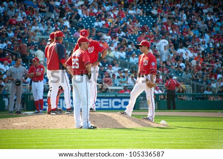 WASHINGTON - JUNE 16:  Washington Nationals players confer on the mound during their game against the New York Yankees, which the Yankees won, on June 16, 2012 in Washington, D.C.