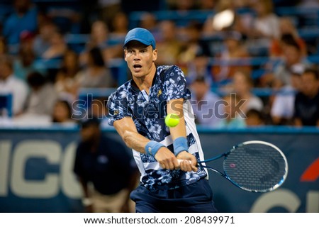 WASHINGTON - JULY 31: Top seed Tomas Berdych (CZE) falls, to Vasek Pospisil (CAN, not pictured) at the Citi Open tennis tournament on July 31, 2014 in Washington DC