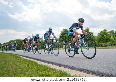 BOWIE, MARYLAND - AUGUST 17: Cyclists compete in the elite men\'s race in the Dawg Days of Summer Circuit Race on August 17, 2014 in Bowie, Maryland