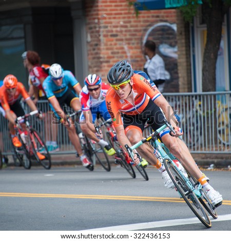 RICHMOND VIRGINIA - SEPTEMBER 27: Cyclists compete in the elite men\'s road race at the UCI Road World Championships on September 27, 2015 in Richmond, Virginia