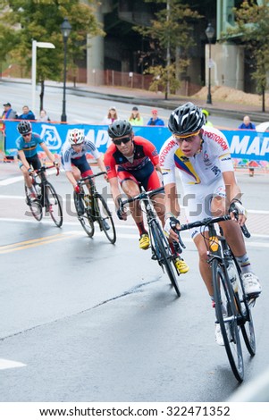 RICHMOND, VIRGINIA - SEPTEMBER 26: Cyclists compete in the junior men\'s road race at the UCI Road World Championships on September 26, 2015 in Richmond, Virginia