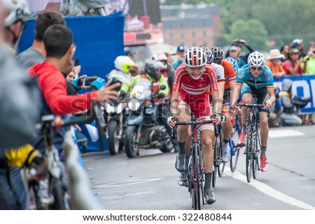 RICHMOND, VIRGINIA - SEPTEMBER 26: Cyclists compete in the junior men\'s road race at the UCI Road World Championships on September 26, 2015 in Richmond, Virginia