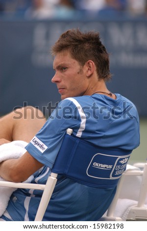 WASHINGTON - AUGUST 10:  Nicolas Mahut (FRA) waits for opponent Wayne Odesnik (USA) to be treated for an injury during the Legg Mason Tennis Classic August 10, 2008 in Washington, DC. Mahut defeated Odesnik.