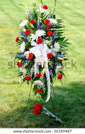 WASHINGTON - AUGUST 30: Wreaths lie at the Arlington Cemetery grave of U.S. Senator Edward Kennedy (D-MA) on August 30, 2009 in Arlington, VA. Kennedy was buried yesterday.