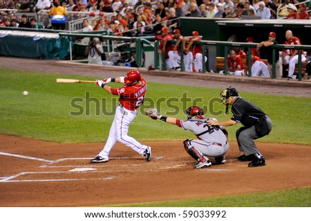 WASHINGTON - AUGUST 14: Ian Kennedy of the Washington Nationals swings at a pitch in the Nationals\' home game against the Arizona Diamondbacks on August 14, 2010 in Washington.