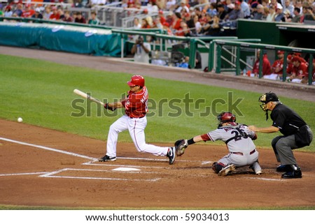 WASHINGTON - AUGUST 14: Jason Marquis of the Washington Nationals swings at a pitch in the Nationals\' home game against the Arizona Diamondbacks on August 14, 2010 in Washington.