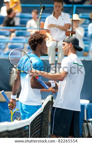 WASHINGTON - AUGUST 4: Top seed French Gael Monfils (L) and American Ryan Sweeting shake hands after their match at the Legg Mason Tennis Classic on August 4, 2011 in Washington.