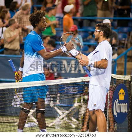 WASHINGTON - AUGUST 5: Top seed Gael Monfils (FRA) and Janko Tipsarevic (SRB) shake hands after their quarterfinal match at the Legg Mason Tennis Classic on August 5, 2011 in Washington. Monfils won.