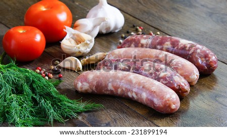homemade raw sausages - chicken and beef sausages with garlic and spices.